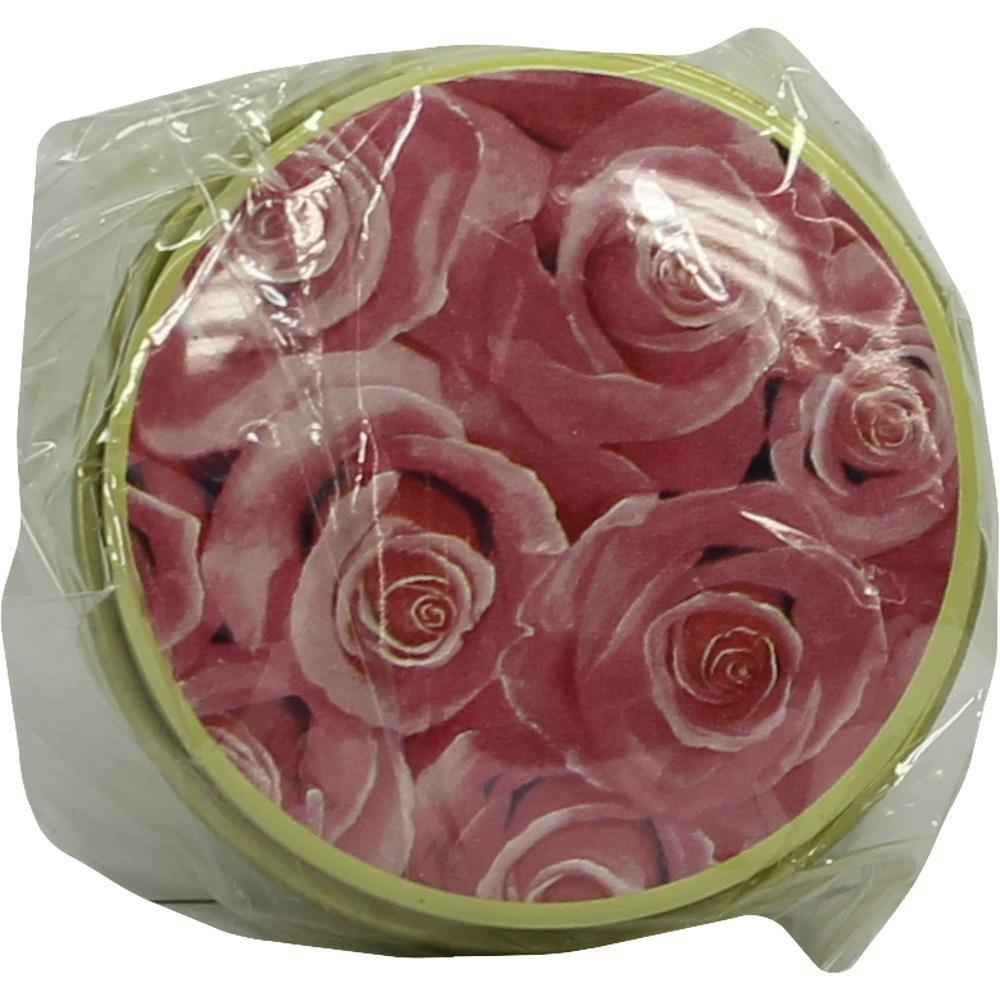 Runde Dose mit Rosenmotiv unter Plastikfolie.